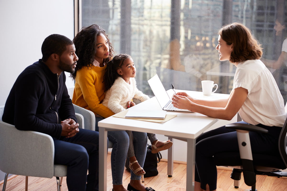 African American family having consultation with female ABA provider